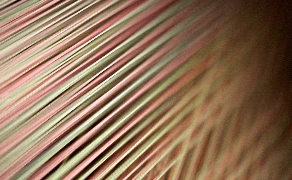 Sized warp sheet on the loom